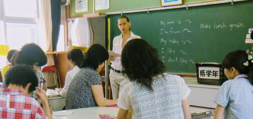 ALT English teacher giving seminar to elementary school teachers in Japan